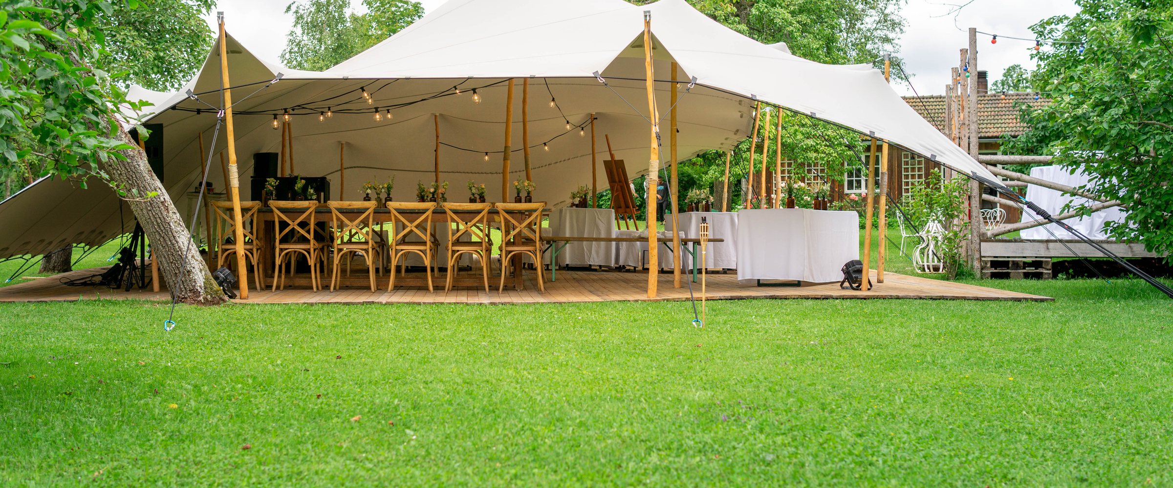 Image of huge tent for a wedding event in the nature