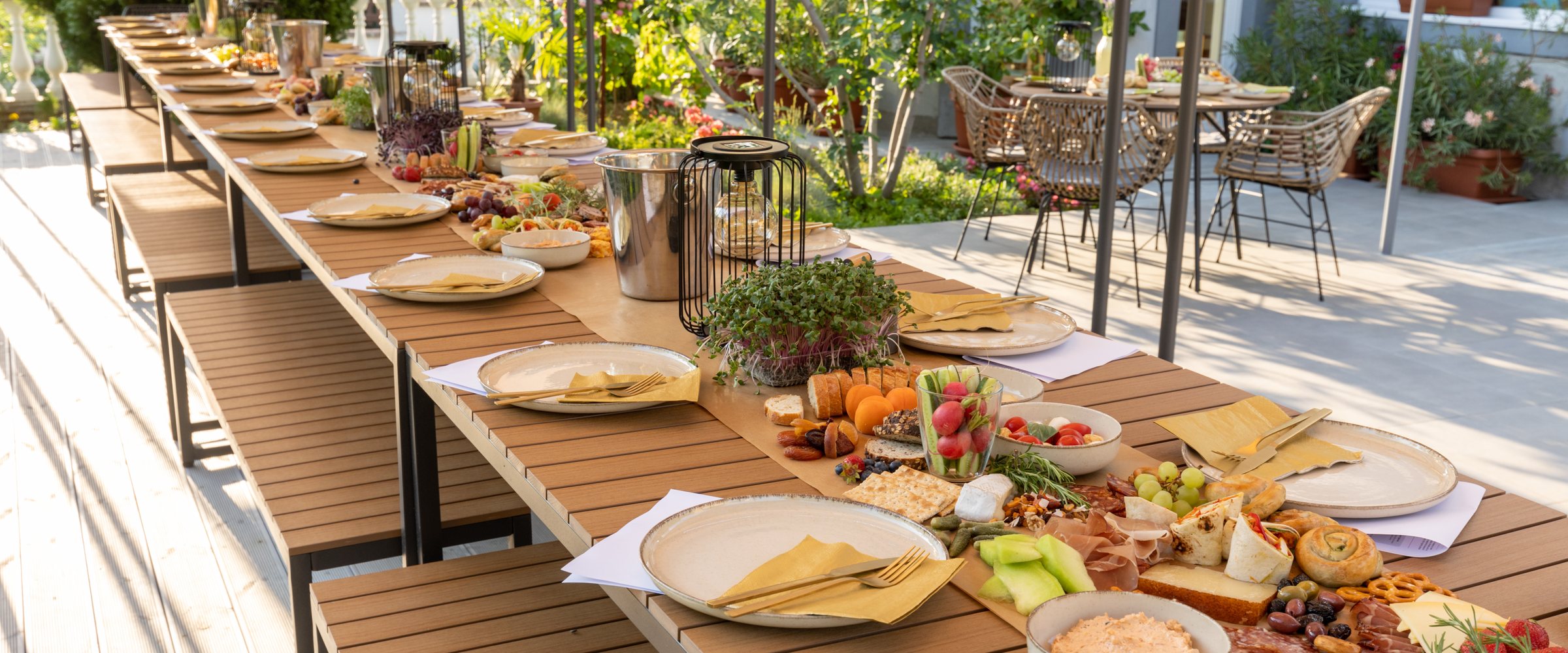 Food served outdoor on a long table