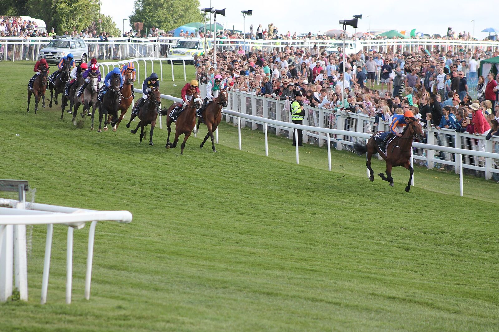 048 Epsom Derby 2015 - The field rounding Tattenham Corner led by Hans Holbein Epsom Derby, The Derby