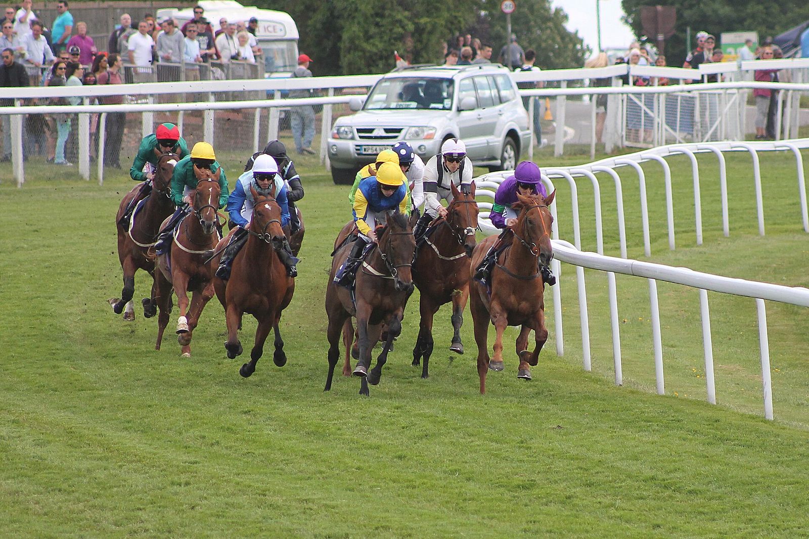 013f - Epsom Derby Day 2015 - Investec Woodcote Stakes - field rounding Tattenham corner Epsom Derby, The Derby