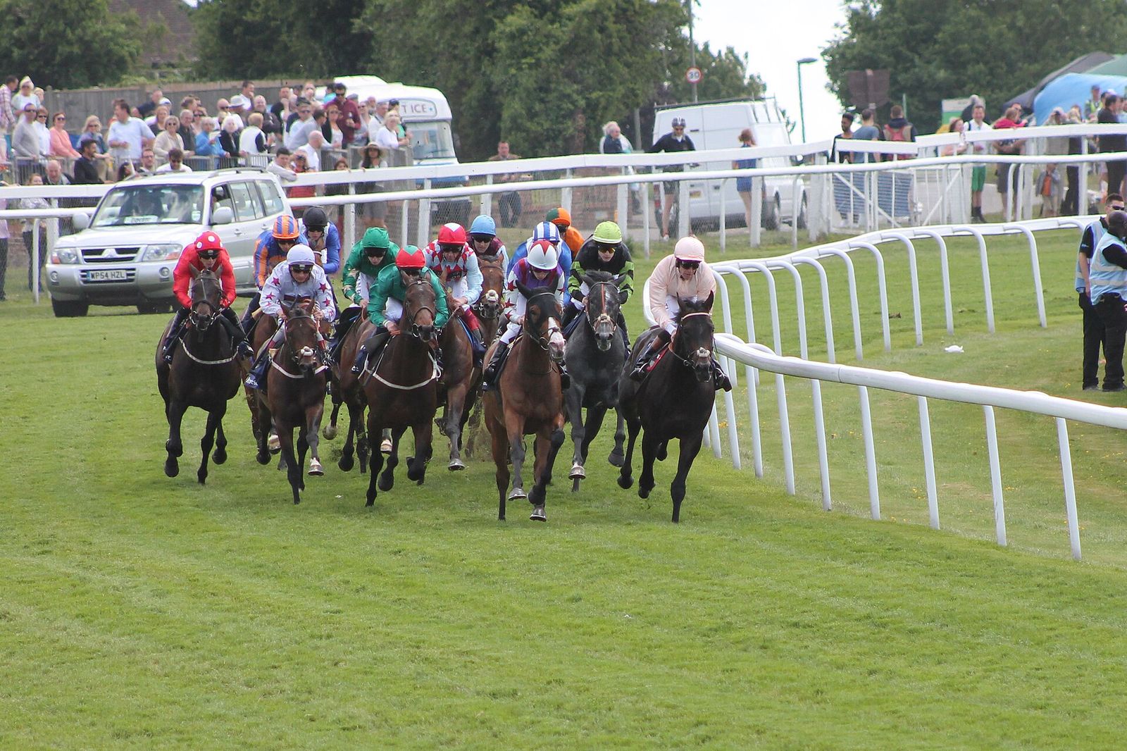 012 Epsom Derby Day 2015 - Investec Private Banking Stakes - field at Tattenham corner Epsom Derby, The Derby