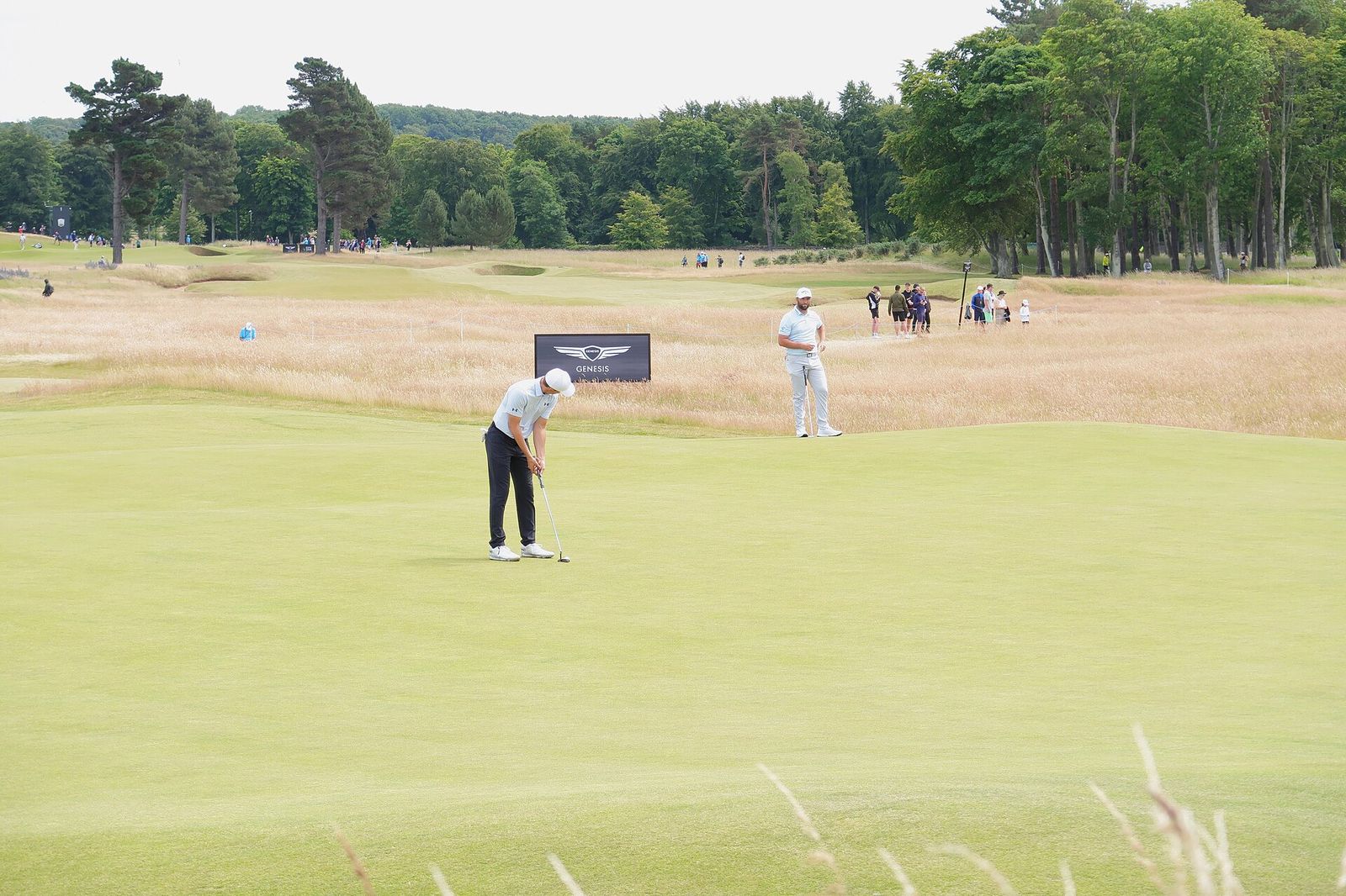 Jordan Spieth putting in a practice round with Jon Rahm at the 2022 Scottish Open PGA Tour tournament held at the, Genesis Scottish Open