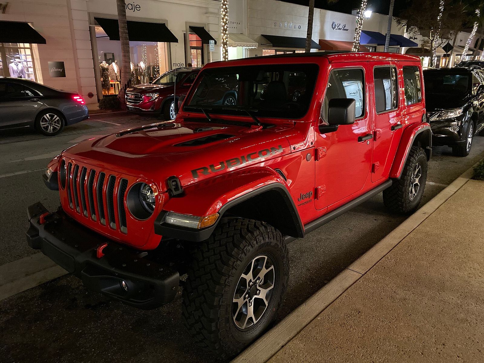 Jeep Wrangler Rubicon (finished in red) on Worth Avenue in Palm Beach, Florida, International Red Cross Ball