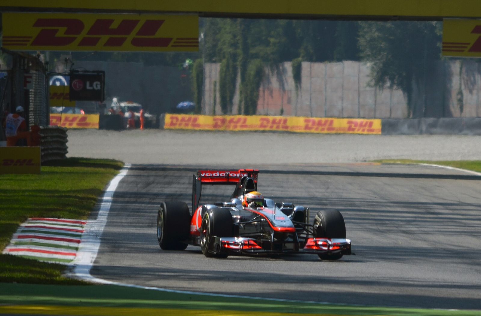 Lewis Hamilton in the McLaren - Mercedes MP4-26 turns into the Roggia chicane at Monza during second practice for the 2011, Italian Grand Prix
