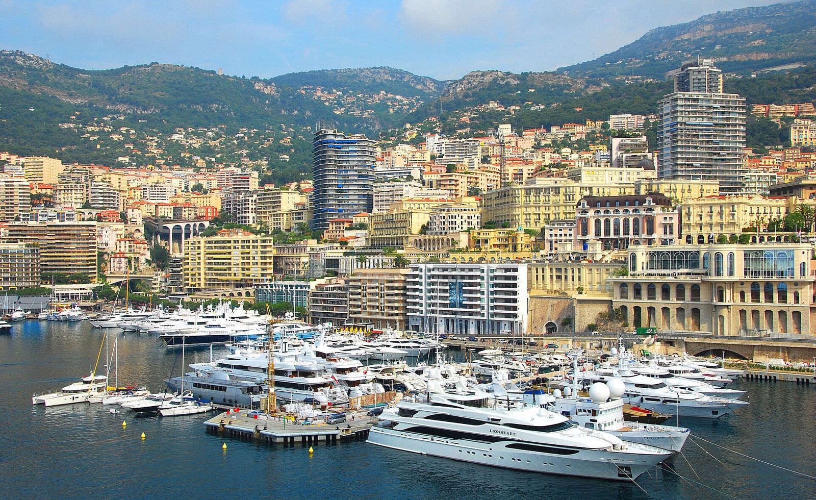 A view of this famous city over the harbour, filled with mega-expensive yachts, Longines Global Champions Tour of Monaco