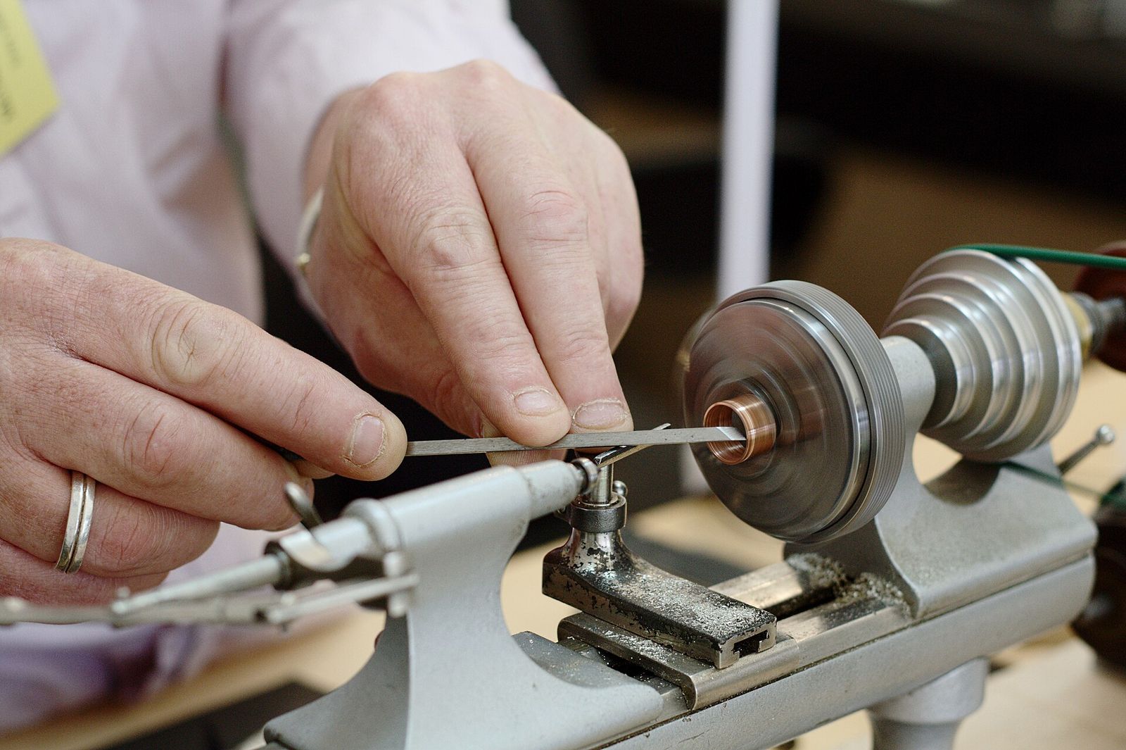 A watchmaker's lathe in use to prepare a decorative watch component cut from copper, Only Watch