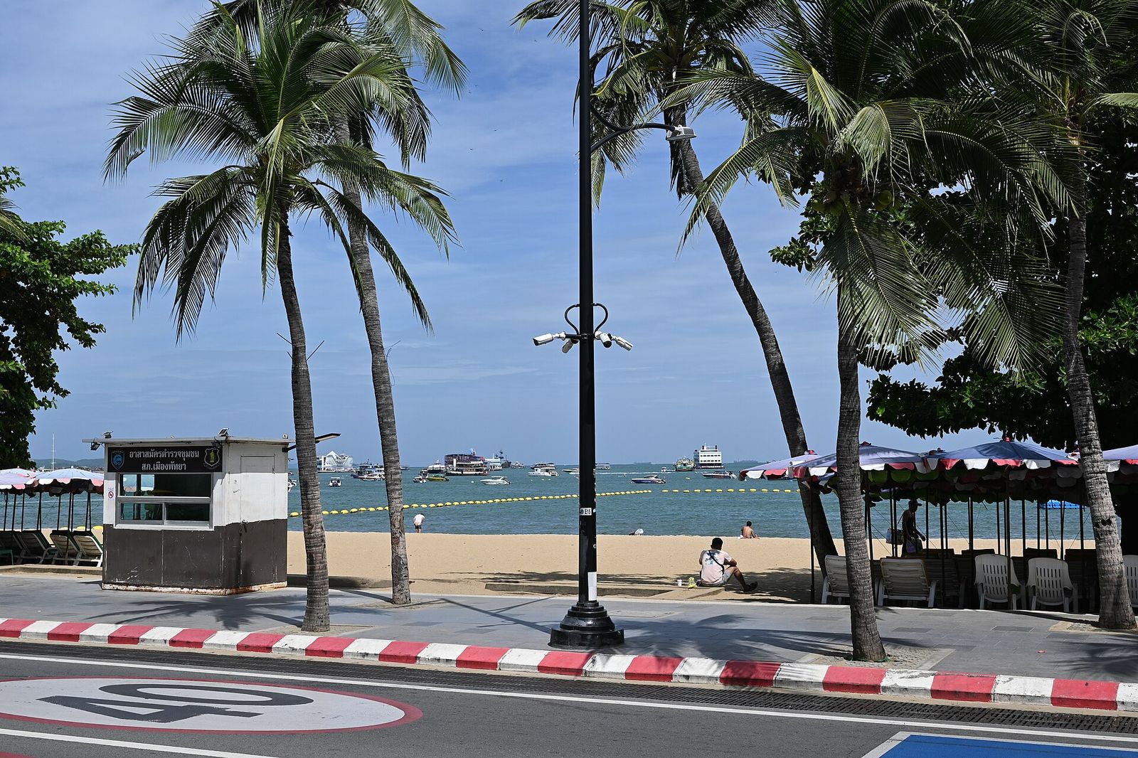 This photo shows a beautiful coastal scene in what appears to be a tropical beach area, Palm Beach International Boat Show
