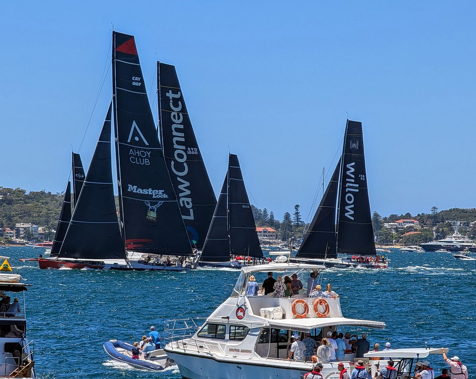 MasterLock Comanche and LawConnect at the starting gun of the Rolex Sydney to Hobart Yacht Race, 2024, Rolex Sydney Hobart Yacht Race