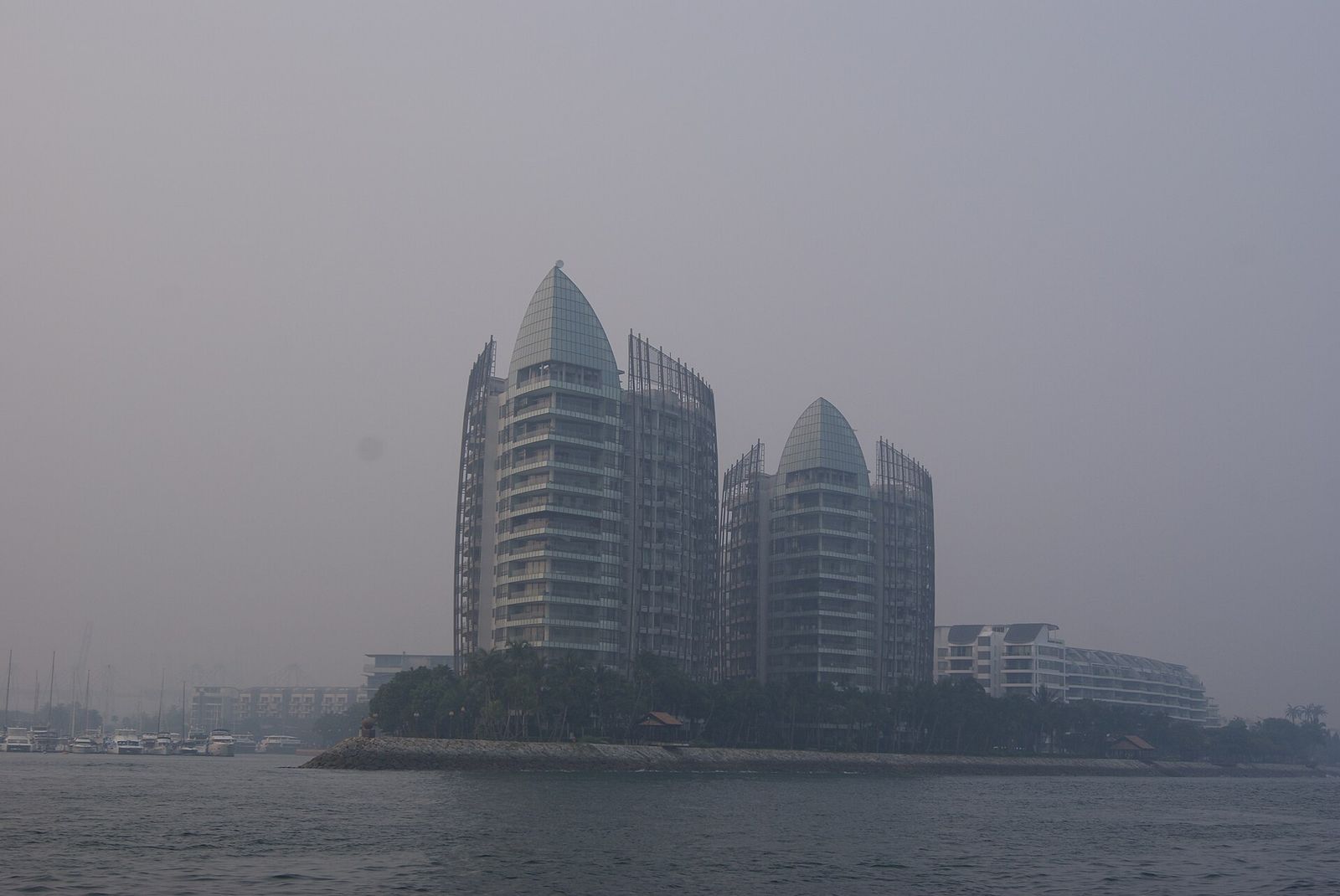 The Oceanfront@Sentosa Cove, a condominium in Sentosa Cove, Sentosa, Singapore, on a hazy evening, seen from a yacht, Singapore Yachting Festival