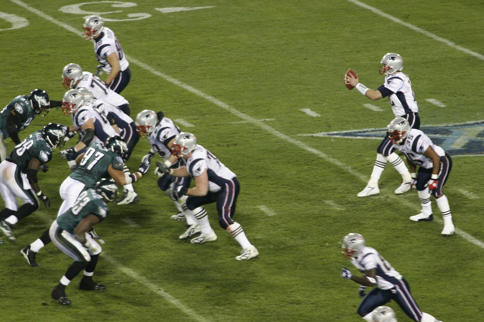 Tom Brady takes the snap during Super Bowl XXXIX. Brady threw for 219 yards to give the Patriots their third Super Bowl