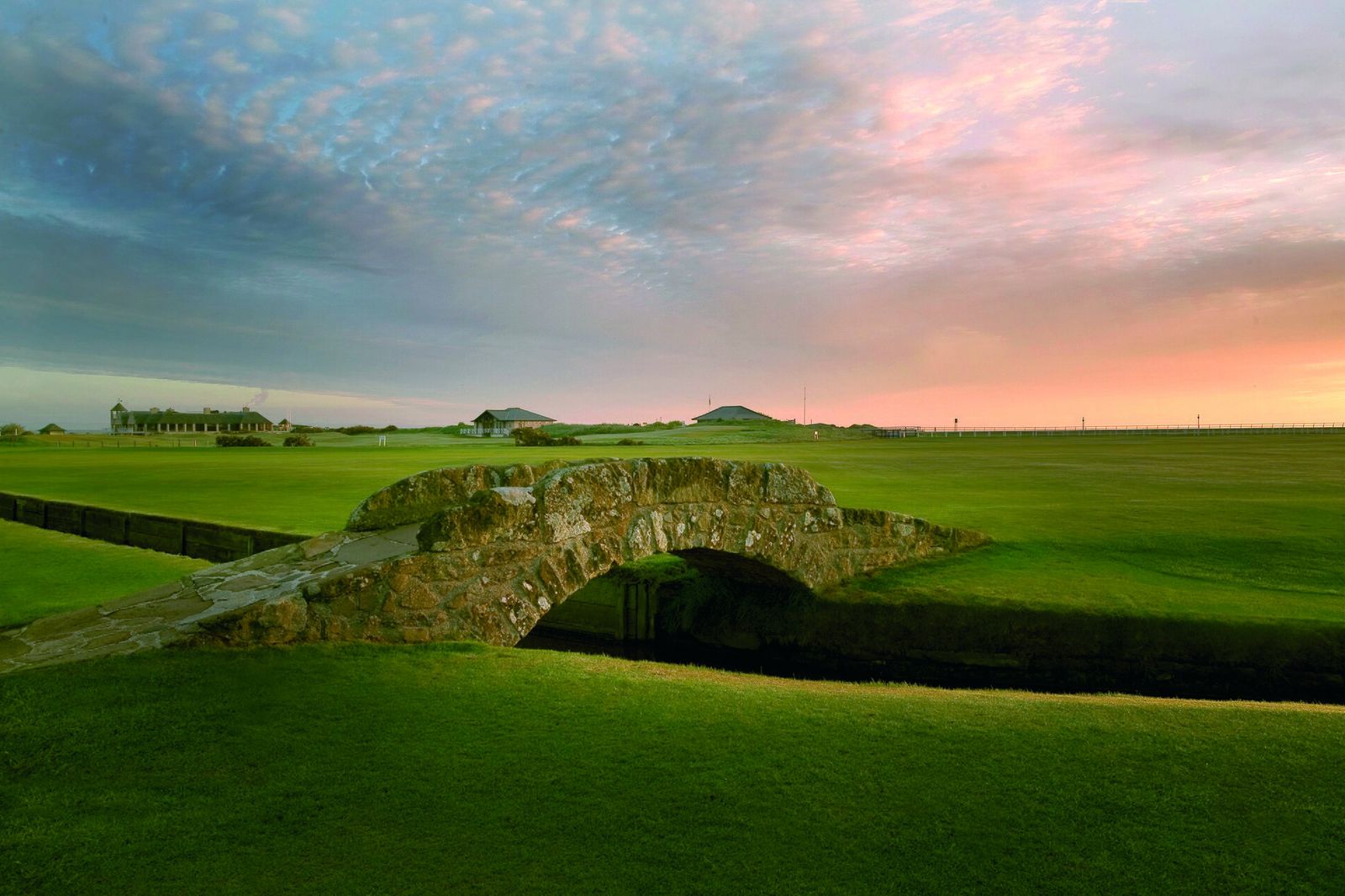 The famous Swilcan Bridge crossing the burn on the approach to the 18th green of the Old Course, The Open Championship